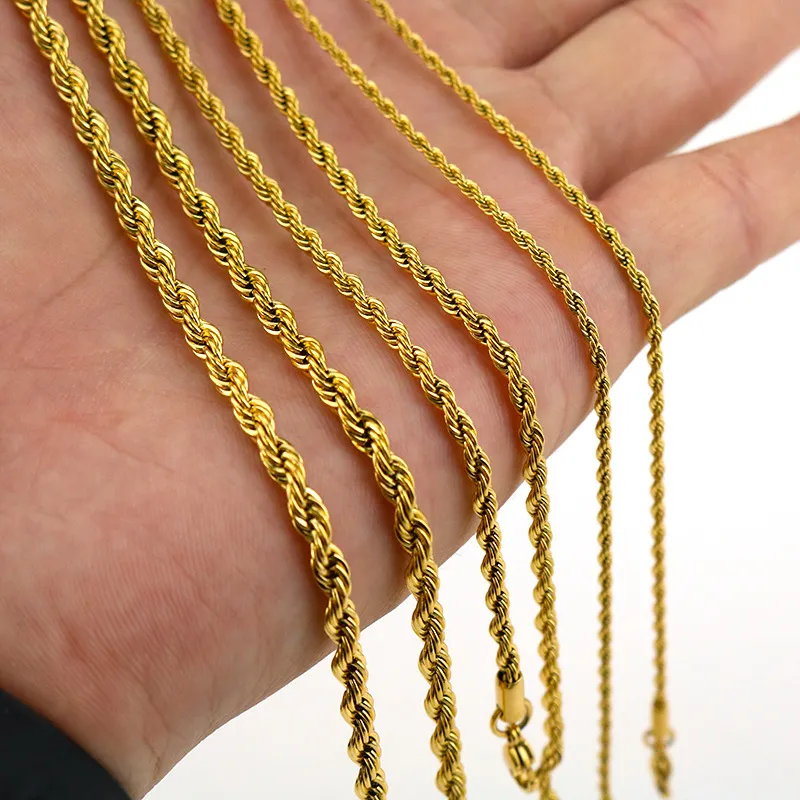 A selection of gold rope chain necklaces in different thicknesses, draped over a hand, featuring a polished finish and intricate twisted link design.