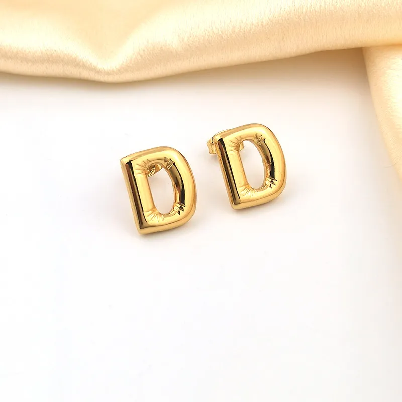 Gold "D" letter stud earrings, waterproof and tarnish-resistant.