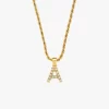 18K gold-plated letter "A" pendant necklace with pearls, displayed on a white background, showcasing a polished and elegant design.