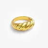 Gold chunky twist ring with a smooth, polished finish, emphasizing its bold and modern design.