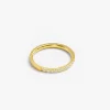 Gold ring with diamonds displayed on a white background, highlighting its polished finish and elegant design.