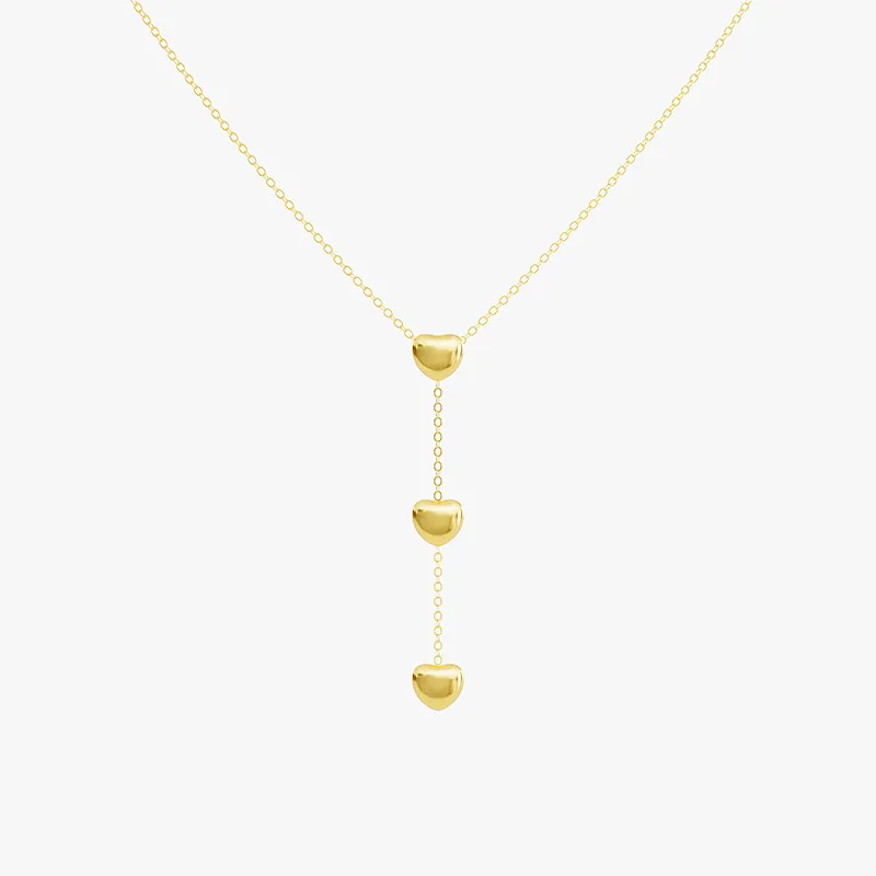 18K gold necklace with three heart pendants on a delicate chain, waterproof and tarnish-resistant.