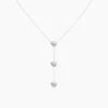Stainless steel necklace with three heart pendants on a delicate chain, waterproof and tarnish-resistant.