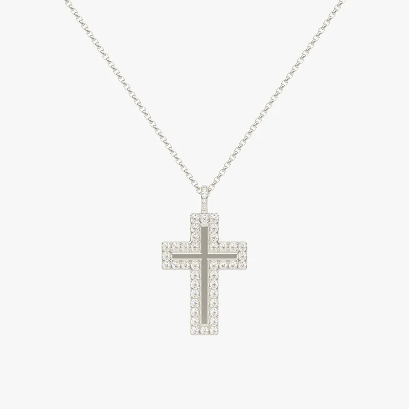 Silver stainless steel cross pendant encrusted with cubic zirconia crystals, hanging from a silver chain.