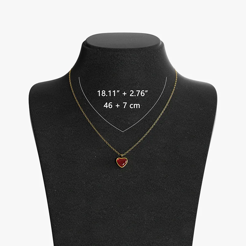 18K gold necklace with a red agate heart pendant, displayed on a black velvet bust with adjustable chain length measurements.